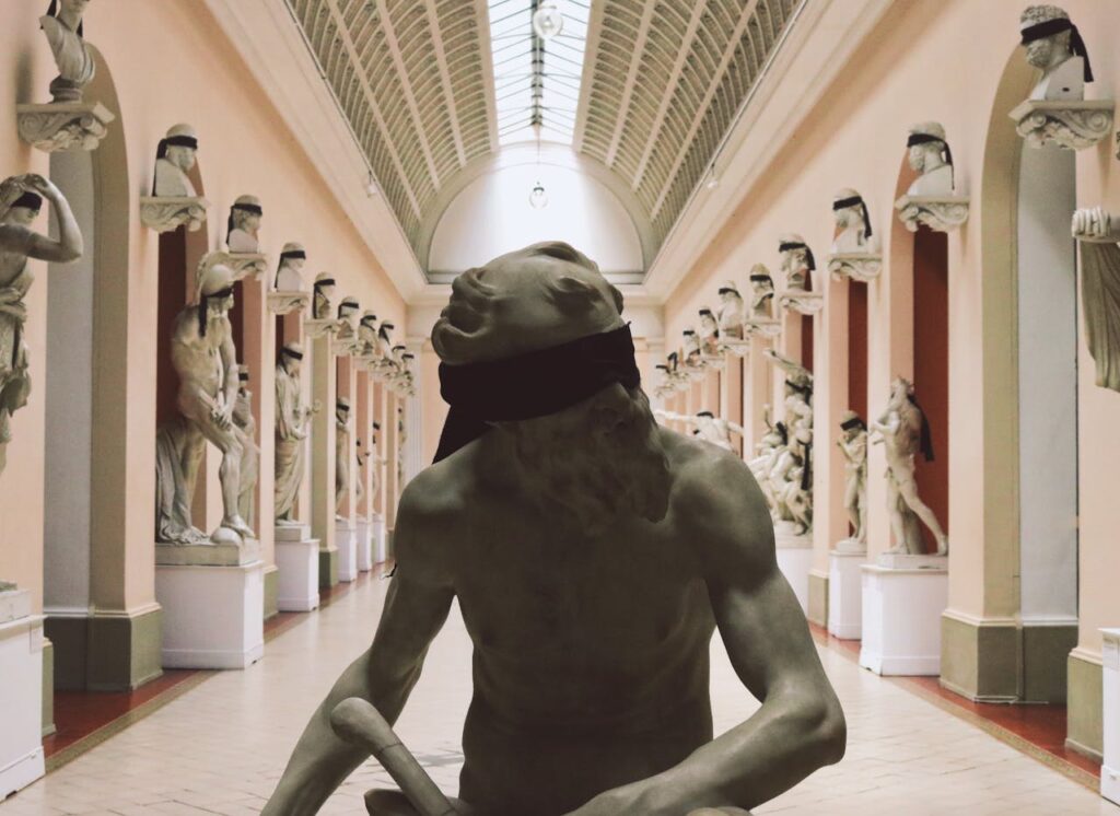 pexels photo 13250884 Art museum hallway with blindfolded classical sculptures in Rio de Janeiro, Brazil.